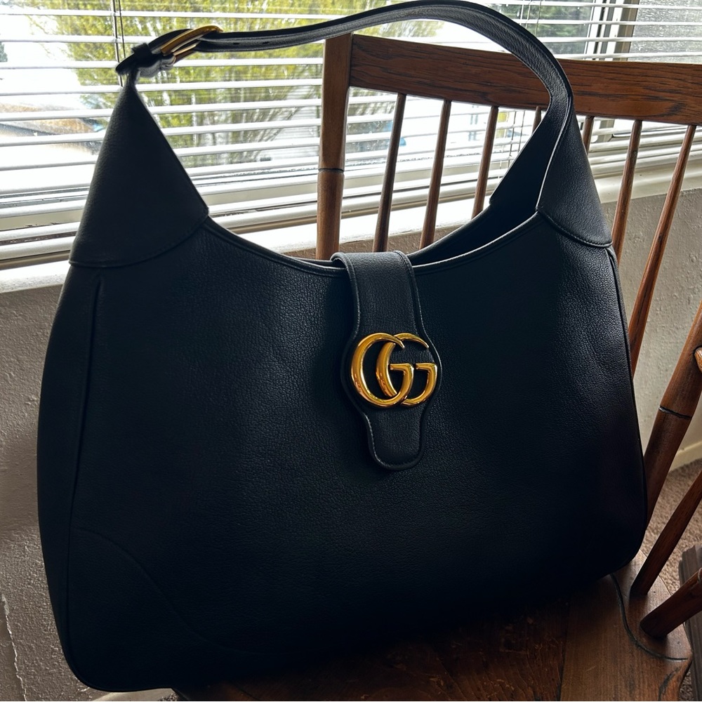 Gucci Black Leather Three-Way bag